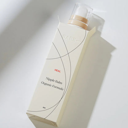 Nipple balm packaging with 'HEAL' branding on a light background