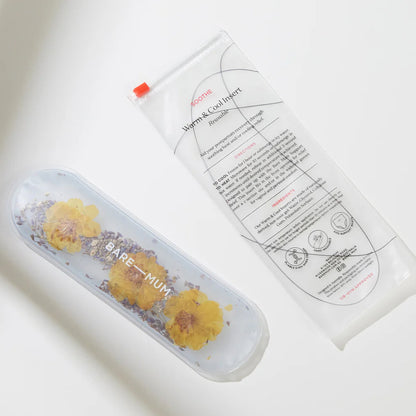 Product packaging with floral design and text on a light background