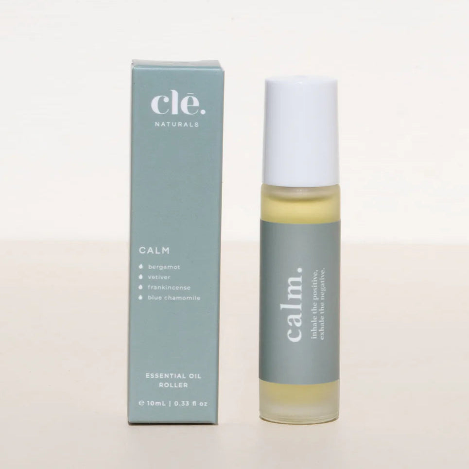 Cle. Naturals Calm essential oil roller bottle and packaging on a light background