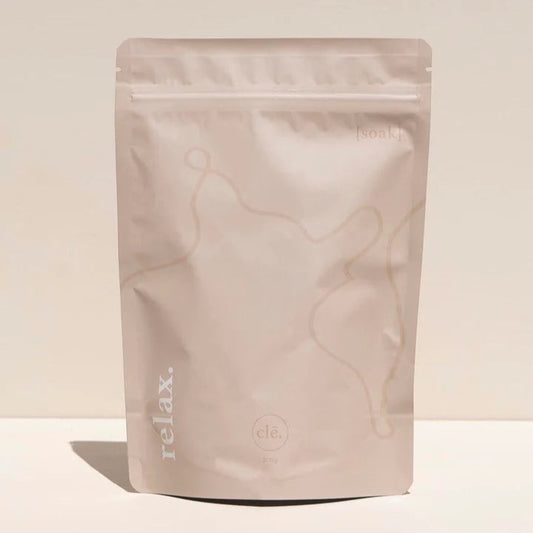 Marble-patterned packaging with 'relax.' text on a beige background