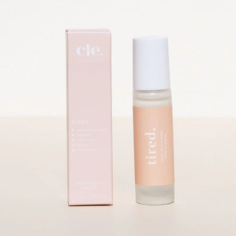 Cle Tired Essentials Oil bottle and box on a light background