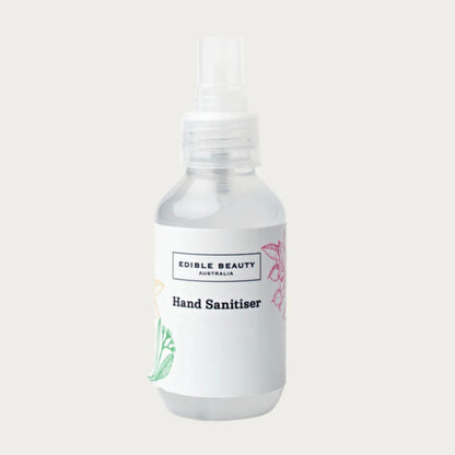 Hand sanitiser bottle with 'Edible Beauty Australia' label on a white background