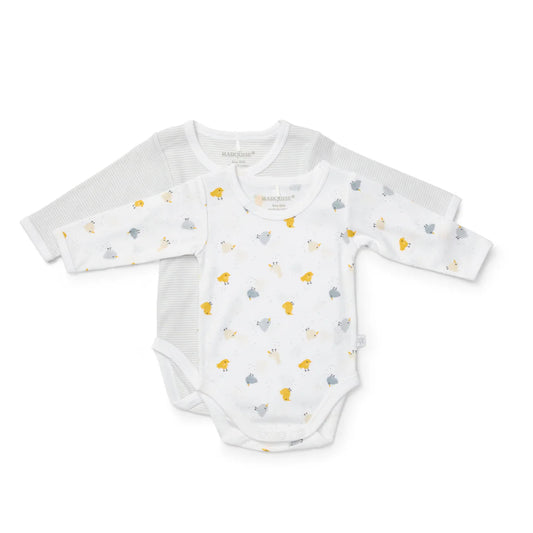 White baby onesie with small colorful patterns on a white background