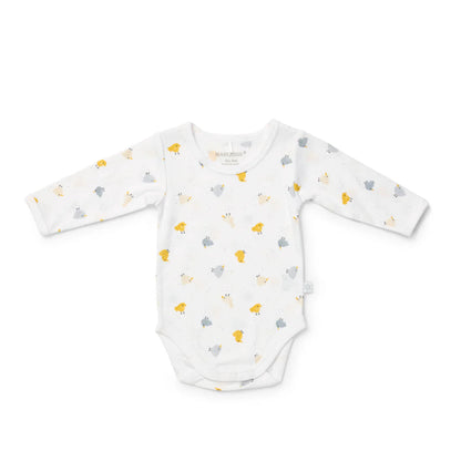 Baby onesie with long sleeves and a pattern on a white background
