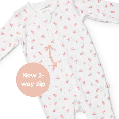 Baby onesie with floral pattern and 2-way zip feature on a white background