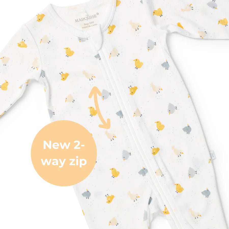 Baby onesie with animal pattern and 2-way zip feature on a white background