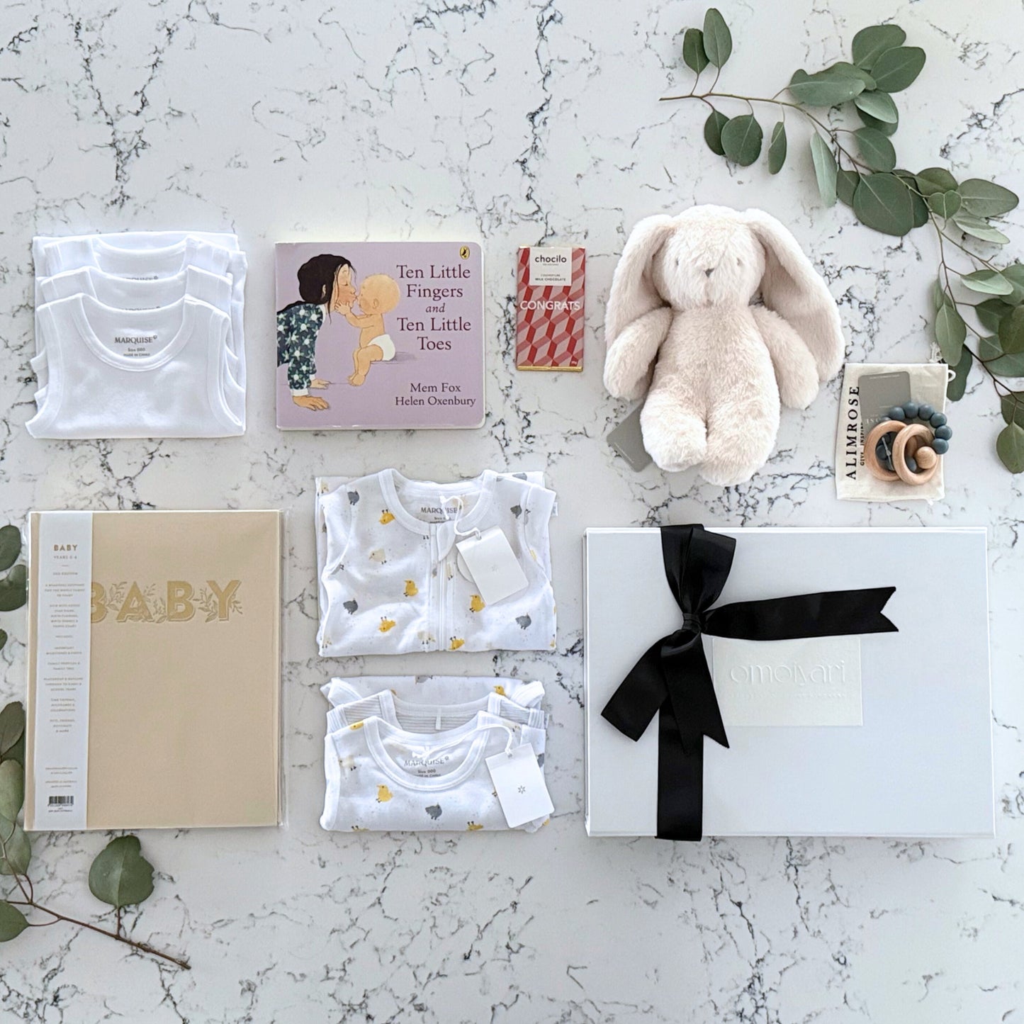 Omoiyari Hello Baby Luxe (gender neutral) Gift hamper box - bunny plush toy, chocolate, Marquise babywear, baby journal, teething ring, board book with green gum leaves.