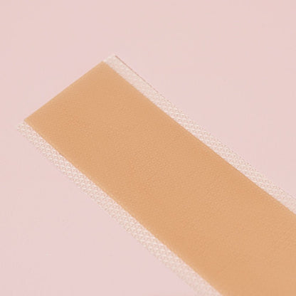 Rectangular bandage on a pink background