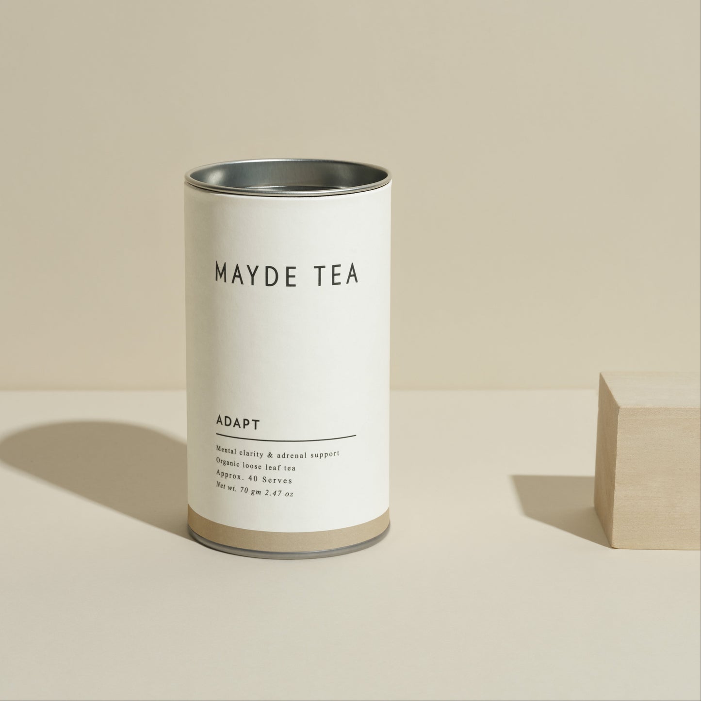 Mayde Tea canister on a beige background