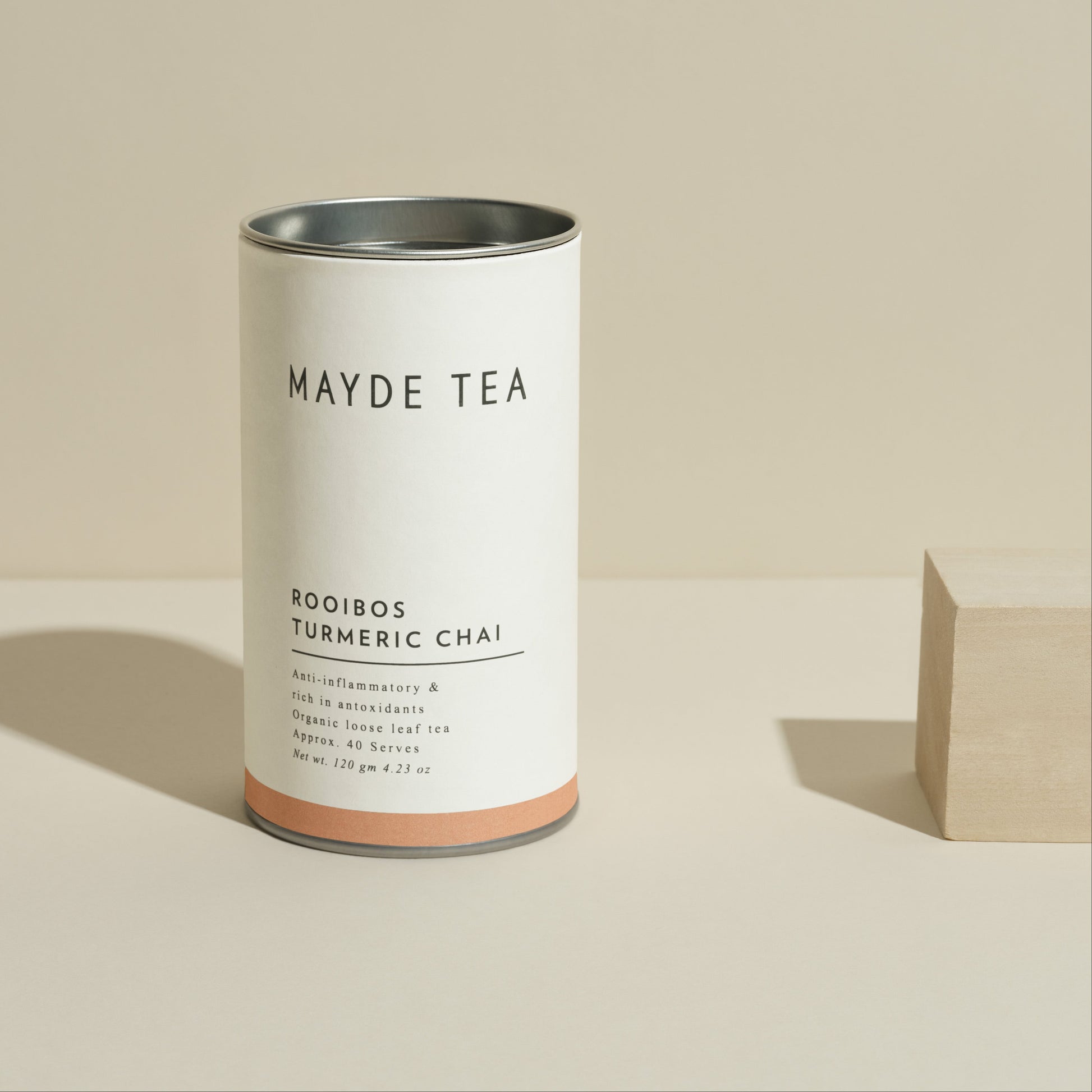 Mayde Tea canister on a beige background